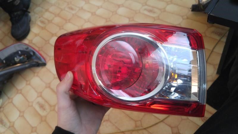 Left taillamp assembly outer used genuine OEM Toyota Corolla 2011-2013