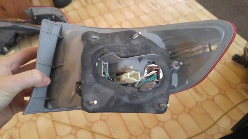Left taillamp assembly outer used genuine OEM Toyota Corolla 2011-2013