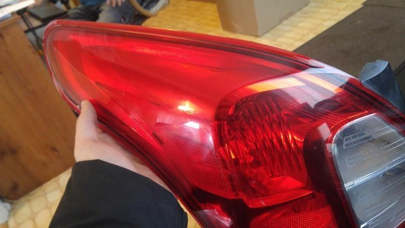 Left taillamp assembly used genuine OEM Nissan Versa 2012-2019