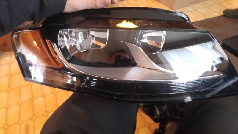 Headlamp Assembly used genuine OEM Audi A4 2012-2016