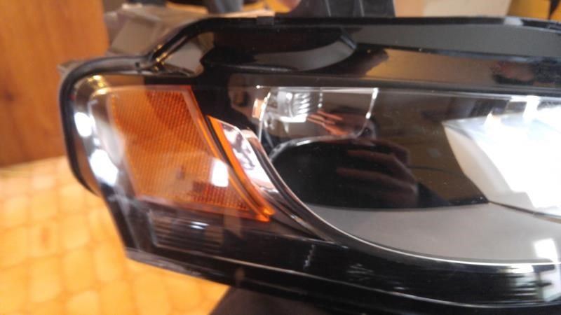 Headlamp Assembly used genuine OEM Audi A4 2012-2016