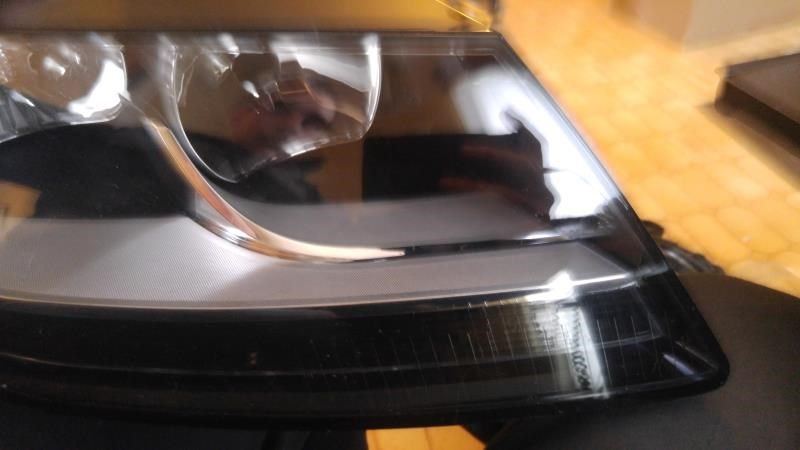 Headlamp Assembly used genuine OEM Audi A4 2012-2016