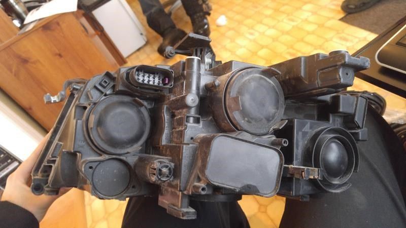 Headlamp Assembly used genuine OEM Audi A4 2012-2016
