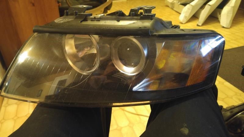 Left headlamp assembly composite used genuine OEM Audi A4 2003-2006