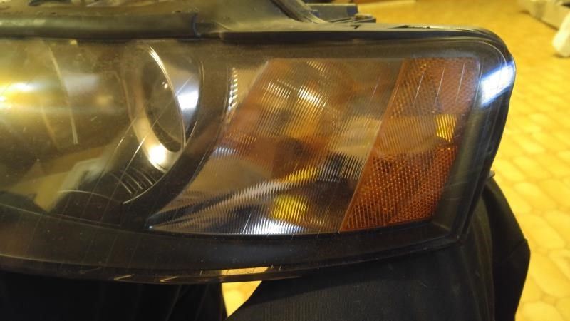 Left headlamp assembly composite used genuine OEM Audi A4 2003-2006