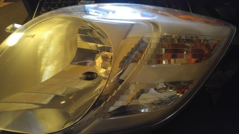 Left headlamp assembly composite used genuine OEM Toyota Yaris 2006-2008