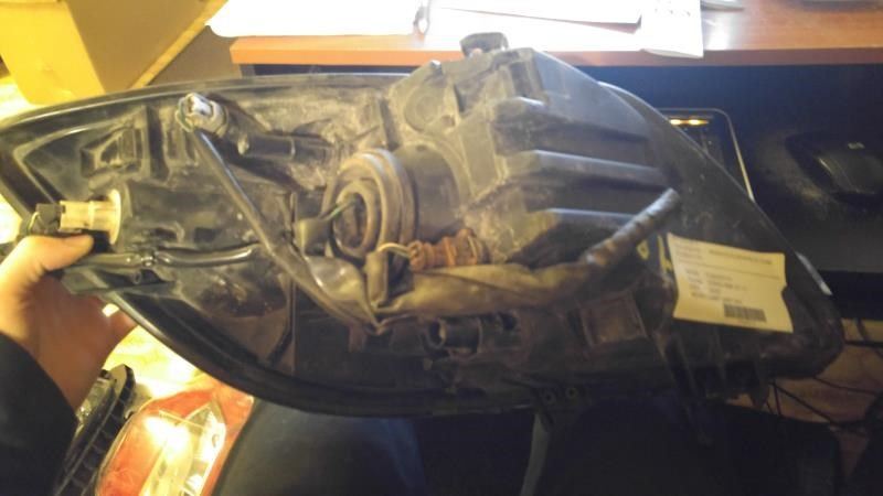 Left headlamp assembly composite used genuine OEM Toyota Yaris 2006-2008