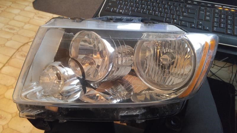 Left headlamp assembly composite used genuine OEM Jeep Grand Cherokee 2011-2013