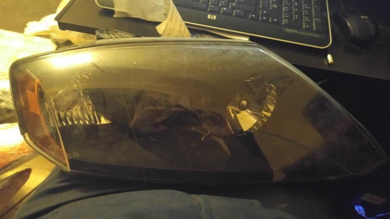 Right headlamp assembly composite used genuine OEM Hyundai Tiburon 2005