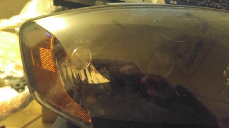 Right headlamp assembly composite used genuine OEM Hyundai Tiburon 2005