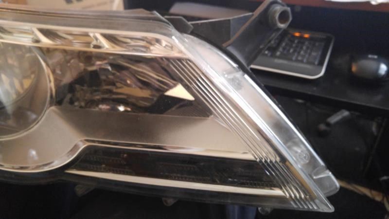 Faro derecho usado original (OEM) Volkswagen Tiguan 2009-2011