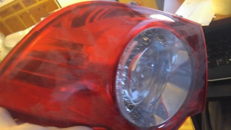 Left taillamp assembly used genuine OEM Volkswagen EOS 2007-2011