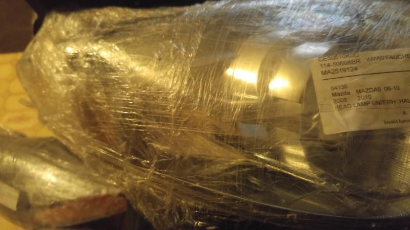 Right headlamp lens/housing used genuine OEM Mazda 5 2006-2007