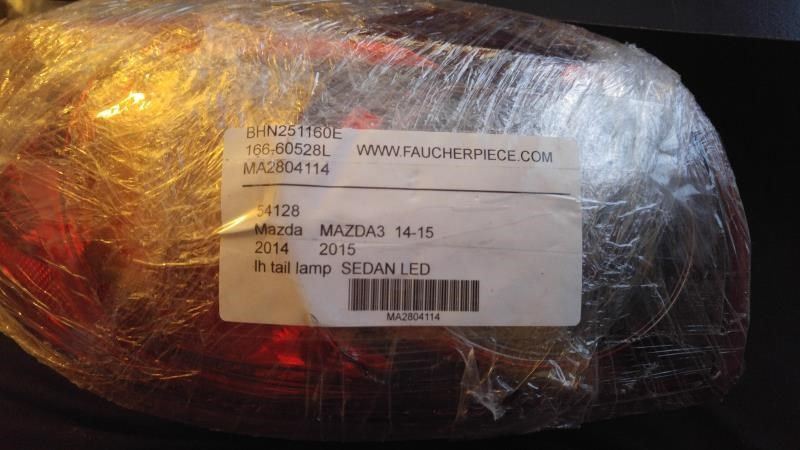 Left taillamp assembly outer used genuine OEM Mazda 3 2014-2018