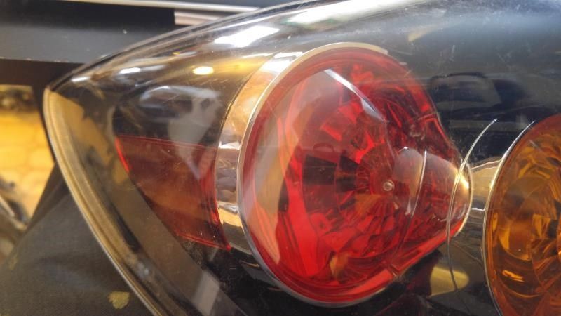 Left taillamp assembly used genuine OEM Mazda 3 2004-2006