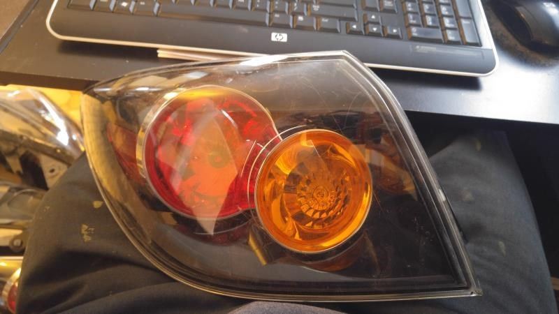 Left taillamp assembly used genuine OEM Mazda 3 2004-2006