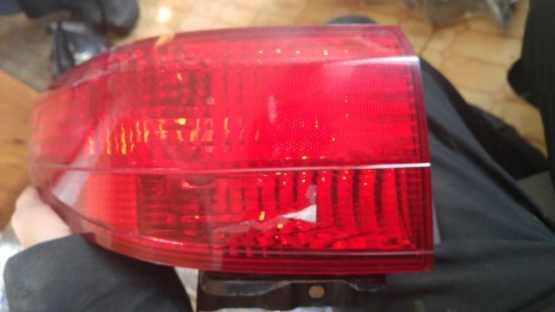 Left taillamp assembly used genuine OEM Honda Accord 2005