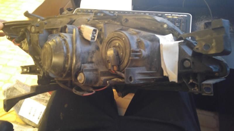 Faro izquierdo usado original (OEM) Subaru Impreza 2012-2014