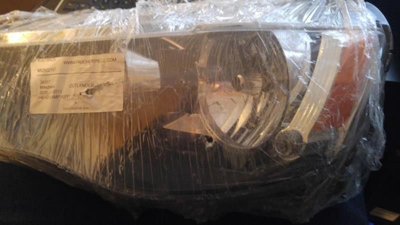 Faro usado original (OEM) Mitsubishi Outlander 2009