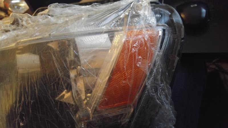 Faro usado original (OEM) Mitsubishi Outlander 2009