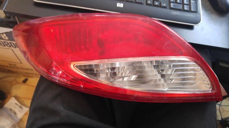 Left taillamp assembly used genuine OEM Mazda 2 2011-2014