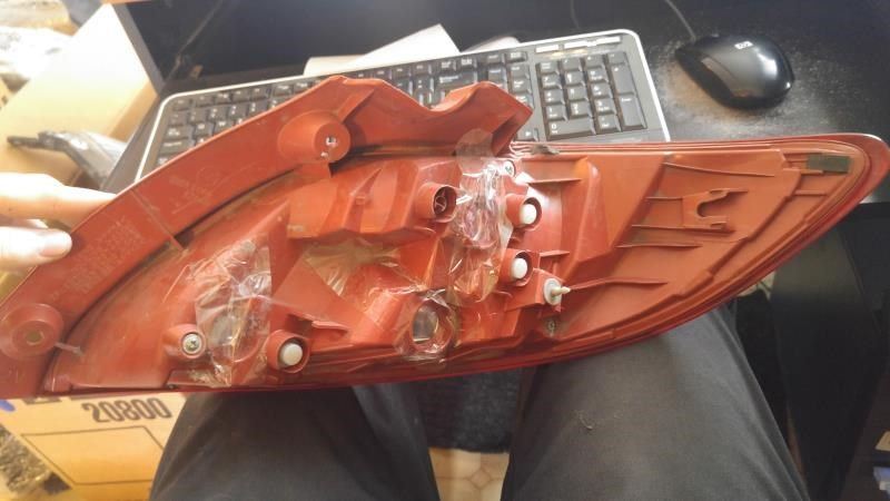 Left taillamp assembly used genuine OEM Mazda 2 2011-2014