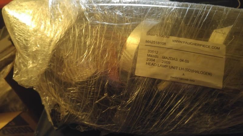 Right headlamp lens/housing used genuine OEM Mazda 3 2004-2009