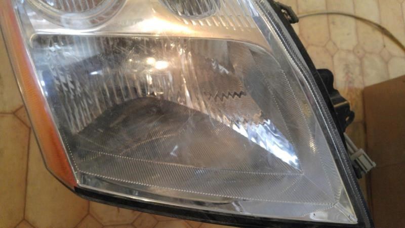 Right headlamp assembly composite used genuine OEM Nissan Rogue 2009-2010