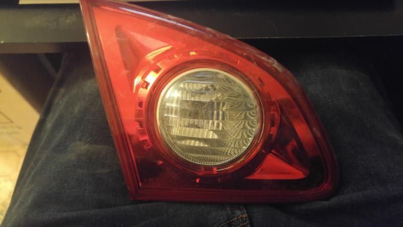 Left taillamp assembly inner used genuine OEM Nissan Rogue 2008-2013