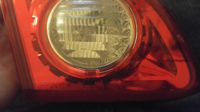 Left taillamp assembly inner used genuine OEM Nissan Rogue 2008-2013
