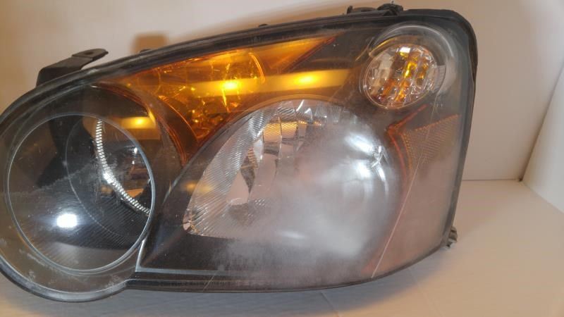 Left headlamp assembly composite used genuine OEM Subaru Impreza 2004