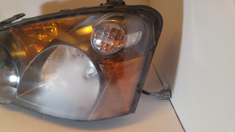 Left headlamp assembly composite used genuine OEM Subaru Impreza 2004