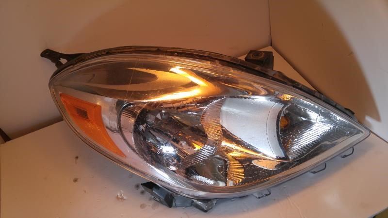 Right headlamp assembly composite used genuine OEM Nissan Versa 2012-2014