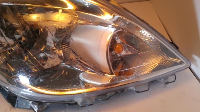 Right headlamp assembly composite used genuine OEM Nissan Versa 2012-2014