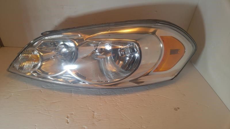 Left headlamp assembly composite used genuine OEM Chevrolet Impala 2006-2013