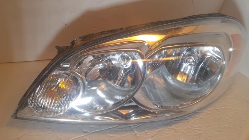 Left headlamp assembly composite used genuine OEM Chevrolet Impala 2006-2013