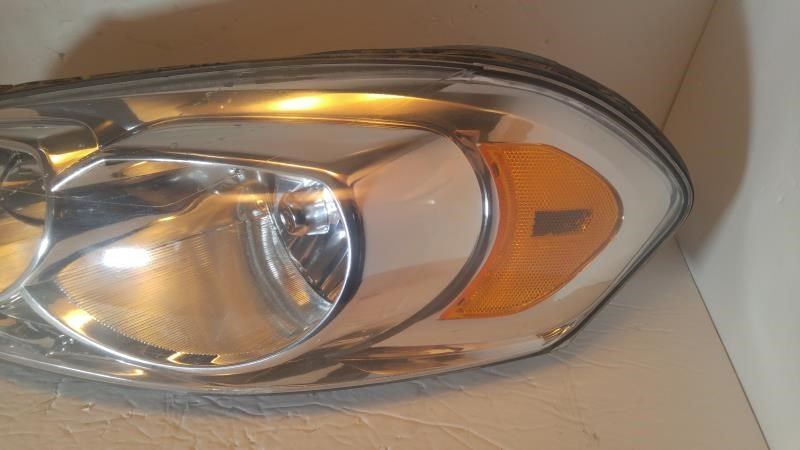Left headlamp assembly composite used genuine OEM Chevrolet Impala 2006-2013