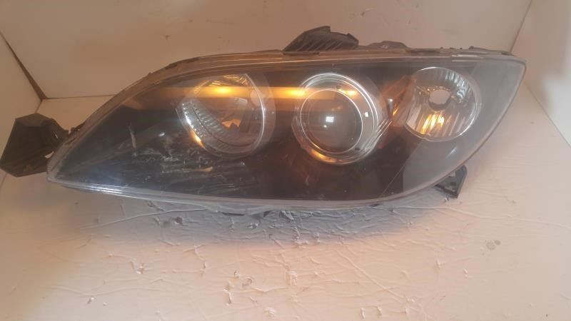 Left headlamp lens/housing used genuine OEM Mazda 3 2004-2009