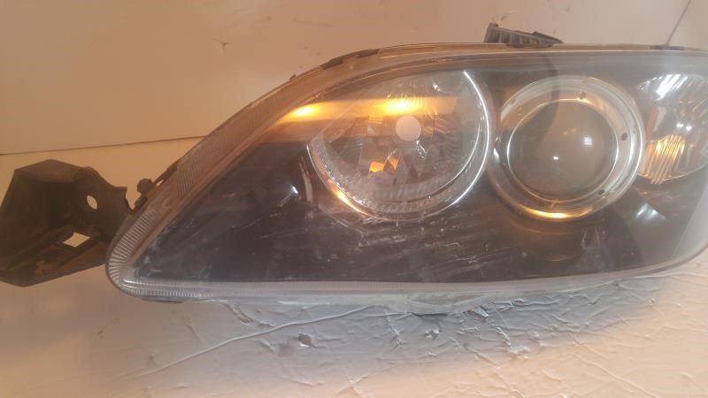 Left headlamp lens/housing used genuine OEM Mazda 3 2004-2009