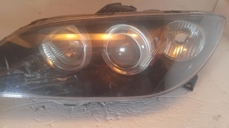 Left headlamp lens/housing used genuine OEM Mazda 3 2004-2009