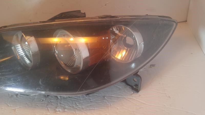 Left headlamp lens/housing used genuine OEM Mazda 3 2004-2009