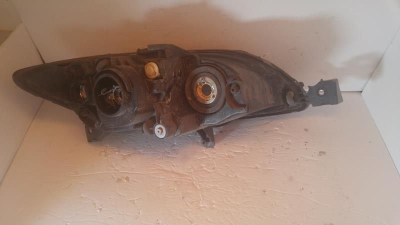 Left headlamp lens/housing used genuine OEM Mazda 3 2004-2009