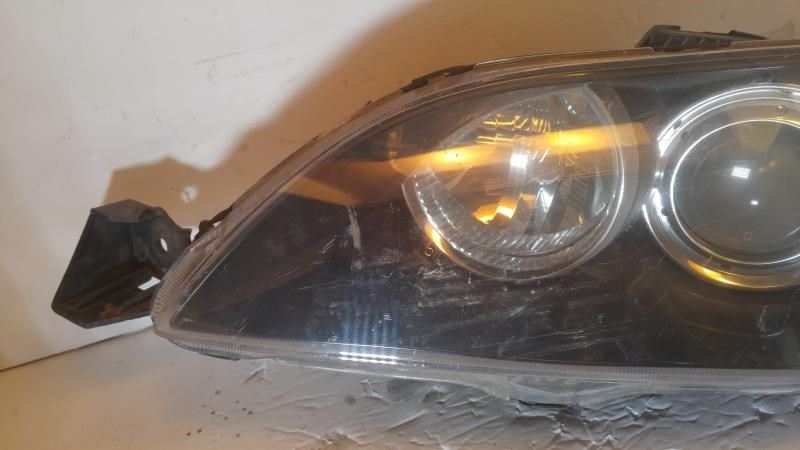 Left headlamp lens/housing used genuine OEM Mazda 3 2004-2009