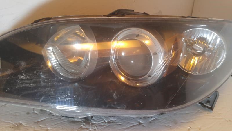 Left headlamp lens/housing used genuine OEM Mazda 3 2004-2009