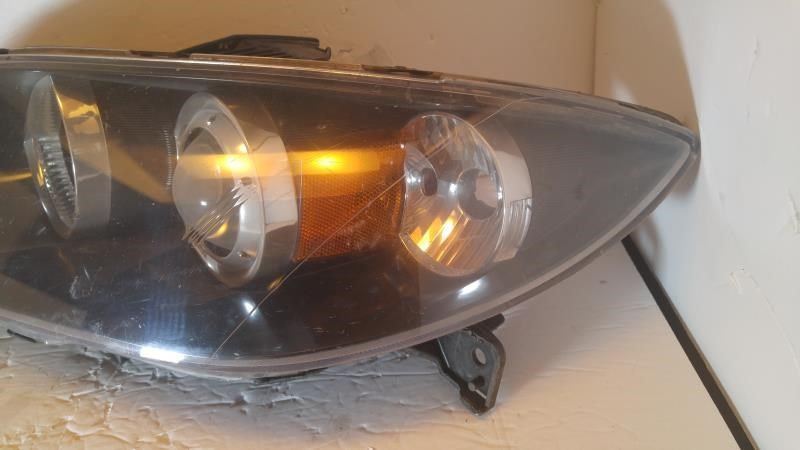 Left headlamp lens/housing used genuine OEM Mazda 3 2004-2009