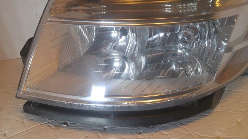 Left headlamp assembly composite used genuine OEM Ford Taurus 2008-2009
