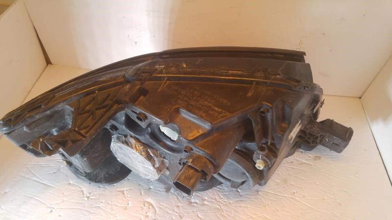 Left headlamp assembly composite used genuine OEM Ford Taurus 2008-2009