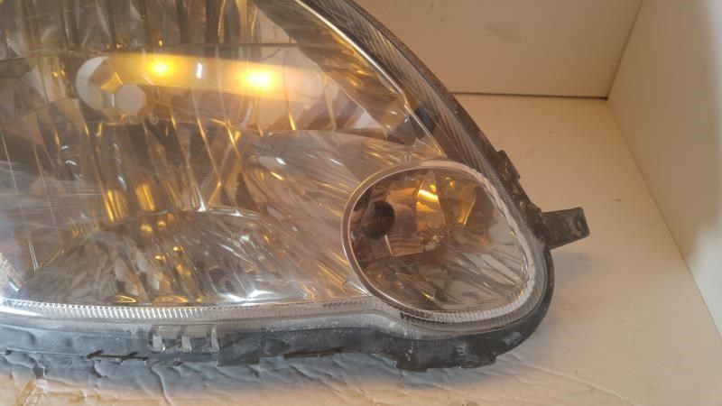 Faro derecho usado original (OEM) Toyota Echo 2003-2005
