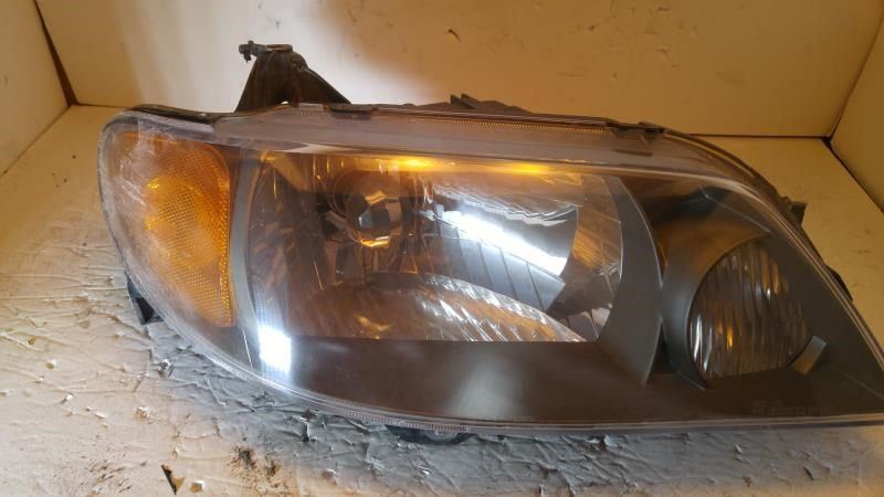 Right headlamp assembly composite used genuine OEM Mazda Protege 2001-2003