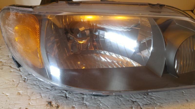 Right headlamp assembly composite used genuine OEM Mazda Protege 2001-2003